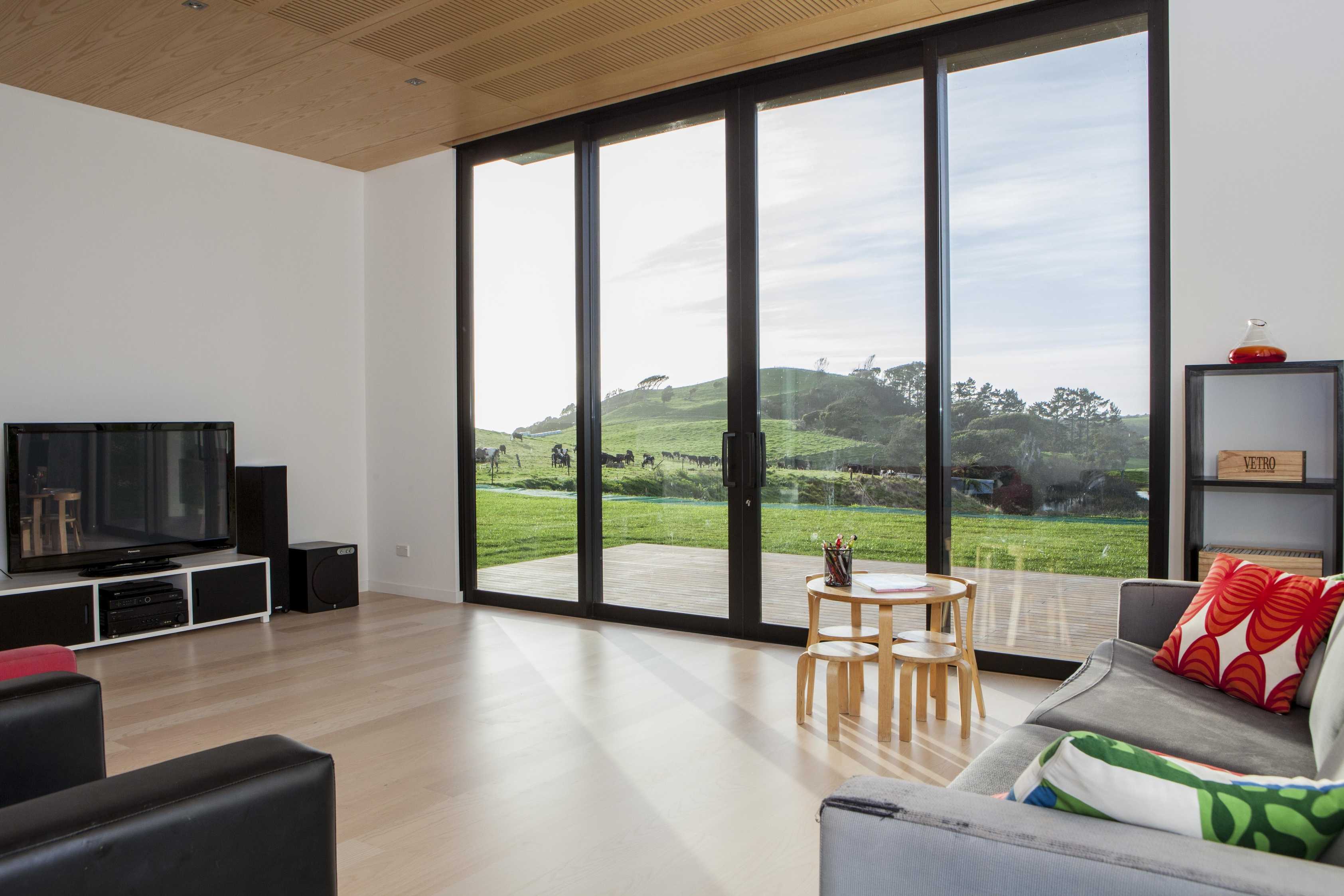 glass doors overlooking paddocks